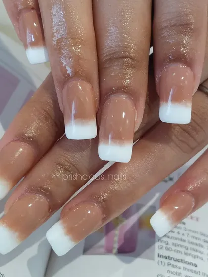 A classic American manicure, or white ombré French. This look gives a softer, more blended alternative to the traditional crisp French tip.