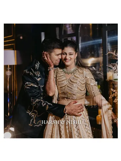 A sweet, candid moment of affection between the couple during their Sangeet. These are the quiet, in-between moments that we love to find amidst the celebration.