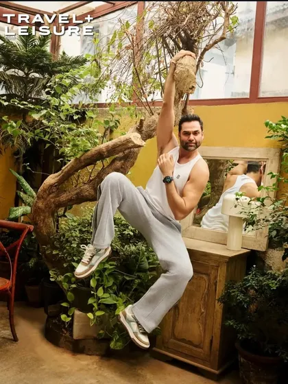A selection of looks from my cover shoot with Abhay Deol for Travel + Leisure. The styling ranged from casual athleisure by Onitsuka Tiger to sharp pinstripe blazers, showcasing a versatile wardrobe for the modern traveler.