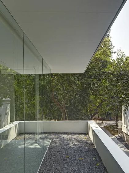 A modern glass-walled extension to the Batley Gallery reflects the historic facade of the main museum building. This juxtaposition of old and new is a recurring theme in our work with heritage structures.