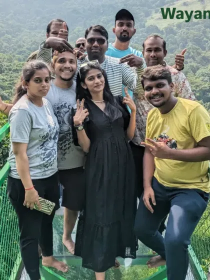 Standing on the glass bridge at 900 Kandi, Wayanad. It's a thrilling spot for photos, with a clear view of the deep valley right below your feet.
