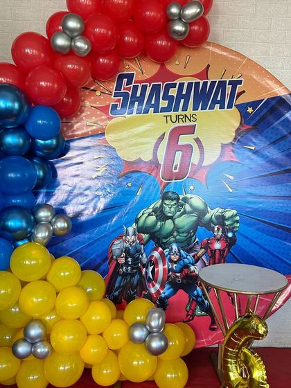 For the little superhero fan, we created this action-packed Avengers-themed birthday backdrop featuring Hulk, Captain America, and other favorite characters.