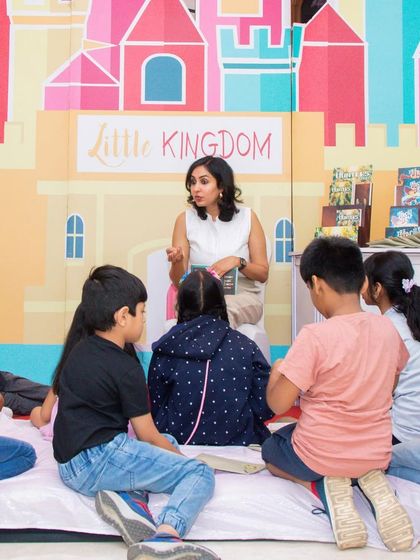 Story time in session! I often partner with authors and storytellers to host engaging sessions for kids, providing a calm and captivating break from the shopping buzz.