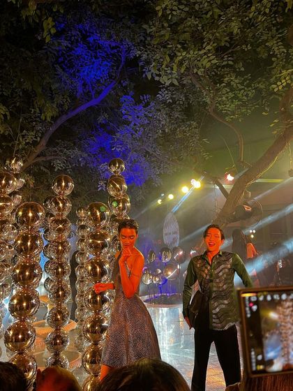 More moments from the runway, highlighting the intricate designs and confident presence of the models.