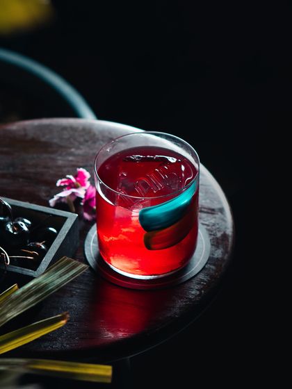 This is 'Shopian', our spirit-forward, Boulevardier-style drink. It's crafted with whiskey, our house Mishri Cherry Vermouth, and a bitter aperitif for a complex, layered taste.