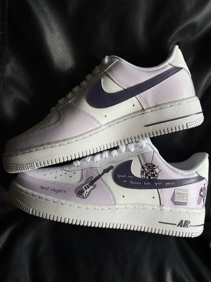 A full pair view of the Taylor Swift "Speak Now" custom sneakers.