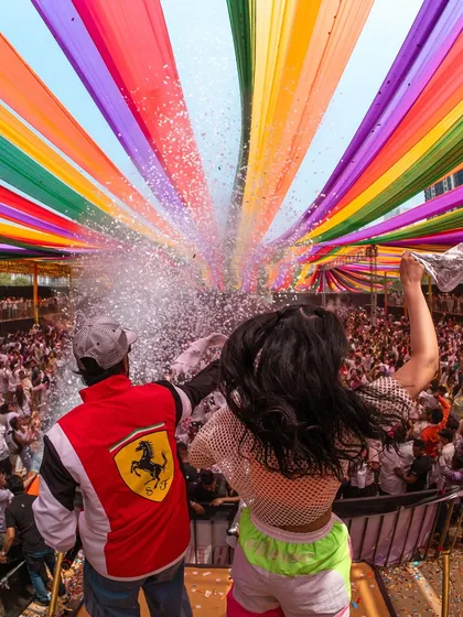 Performing at massive festivals is an incredible rush. This was at a Holi 2025 event in Thane, where I played for a huge crowd under a canopy of colors, complete with confetti blasts.