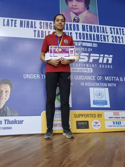 Ananya Chande with her runner-up trophy and semi-finalist medal at the second state ranking tournament. Performing well in multiple age categories like U-17, U-19, and U-21 is a huge accomplishment.