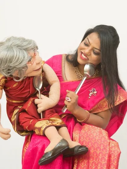 This picture perfectly captures a daily dilemma for many women, "What to cook for breakfast?". Here, Ajji and I are playfully fighting with ladles, a funny take on a very real situation.