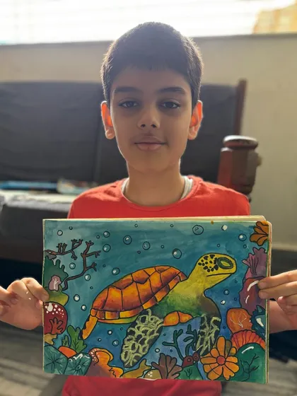 A student's detailed drawing of an underwater scene with a turtle. This piece shows a great understanding of composition and colour.