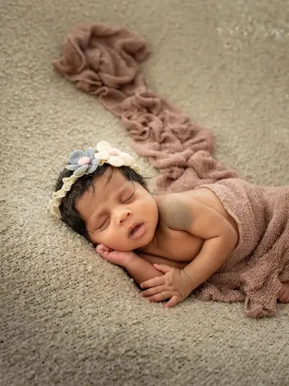 A full view of this sleeping beauty, wrapped so gently. I always make sure to capture these full-body shots to remember how small they once were.