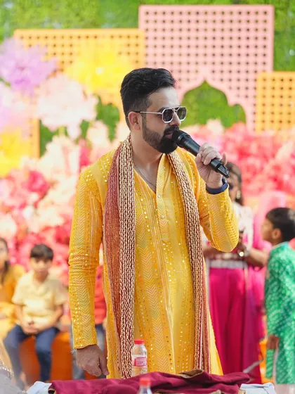 Hosting the rituals at a Haldi ceremony. I blend traditional moments with modern, interactive fun.