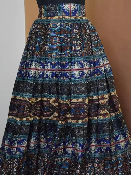 This beautiful Kalamkari-inspired printed skirt offers endless styling possibilities. Pair it with a simple crop top or a short kurti to create a stunning fusion look.