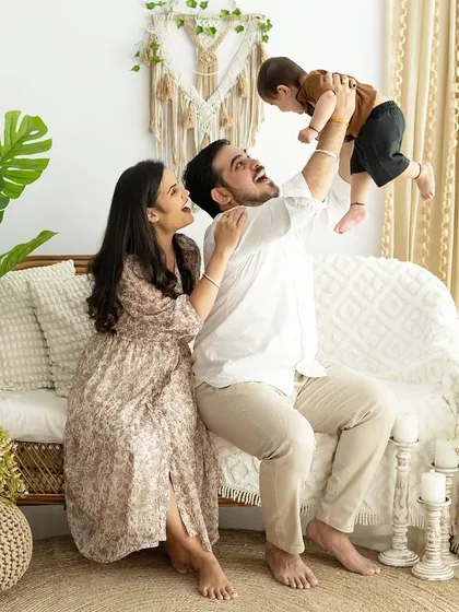 The pure joy of parenthood. Photos like this, full of laughter and love, are the perfect moments to turn into a family keepsake that will make you smile every time you see it.