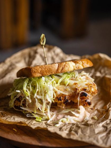 Juicy, crunchy, smoked and tender. The ultimate buttermilk chicken sandwich. This is the best bite in town.