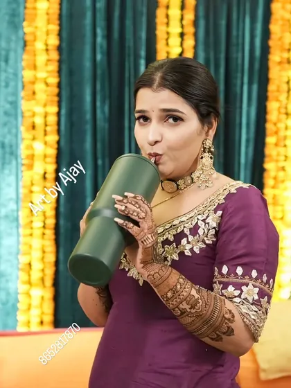 A fun, candid shot of a client at her mehndi function.