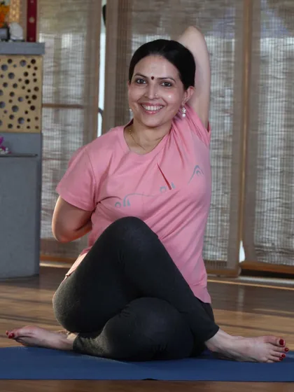 Here I am in Gomukhasana. As Guruji taught, we must create space in the muscles and skin so the body's fine network can fit into the asana.