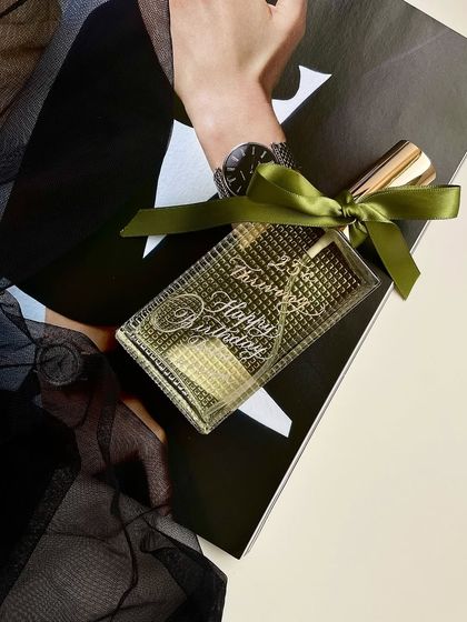 Marking every milestone. This perfume bottle was engraved with a 'Happy Birthday' message, turning a lovely gift into a cherished memory.