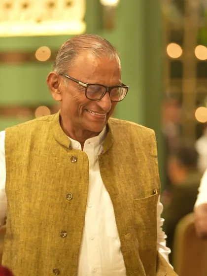 A candid shot of one of our senior members, representing the generations of experience and passion that are the foundation of Chetak Caterers.