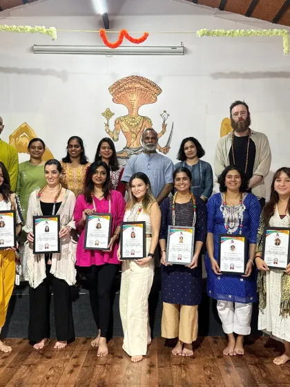 Celebrating our newest certified Aerial Yoga teacher. This photo captures the pride and accomplishment after completing our specialized aerial program.