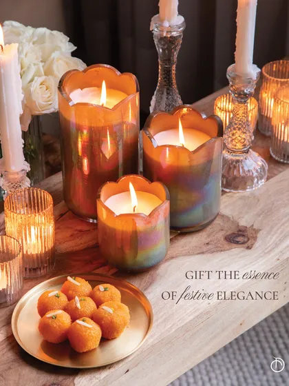Gift the essence of festive elegance. The Zen Lotus candles, with their delicate, flower-like shape and iridescent finish, are a beautiful way to add light and fragrance to your festive decor.