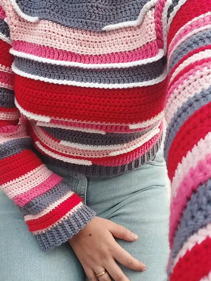 A selfie view showing the fit and feel of the Candy Crush Pullover.