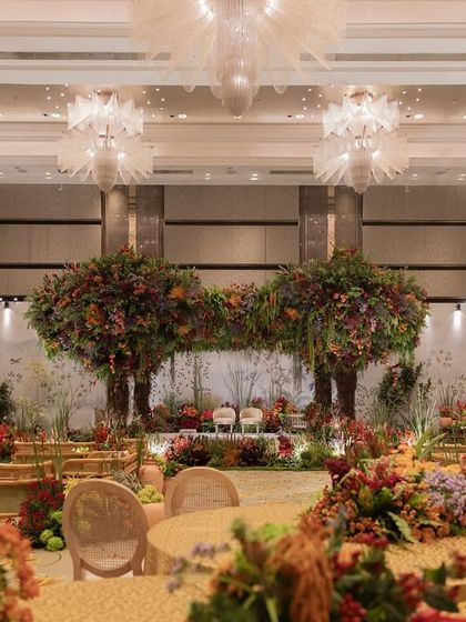 A wide view of the 'Orchard of Life' naming ceremony, capturing the grandeur of the indoor forest.