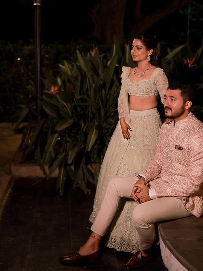 A stylish couple shot. Her elegant, understated makeup ensures she looks polished and beautiful without overpowering her natural features.