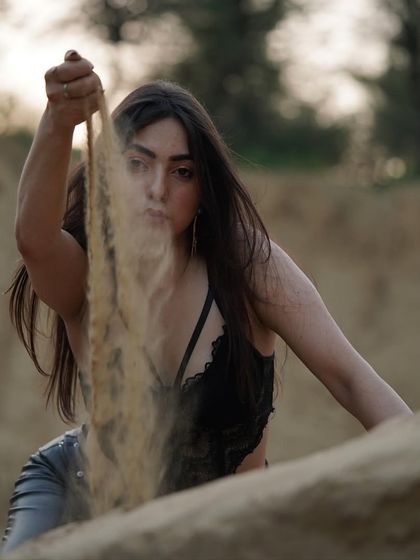 Another raw image from the sand shoot, capturing the movement of the sand falling.