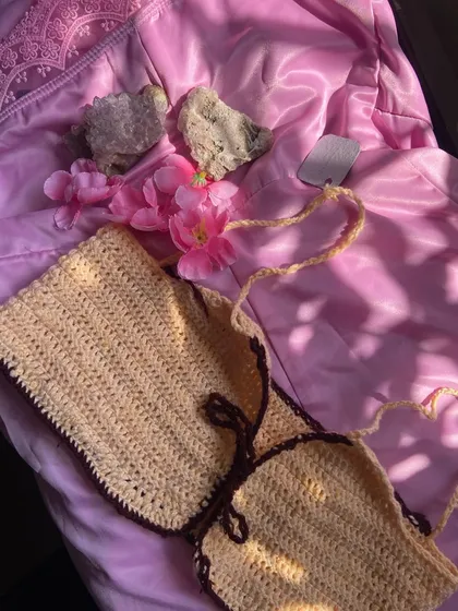 This shot captures the soft texture of the yarn in natural sunlight. All my bikini tops are handmade with breathable cotton yarn, making them comfortable for warm weather. Just DM me with your color ideas.