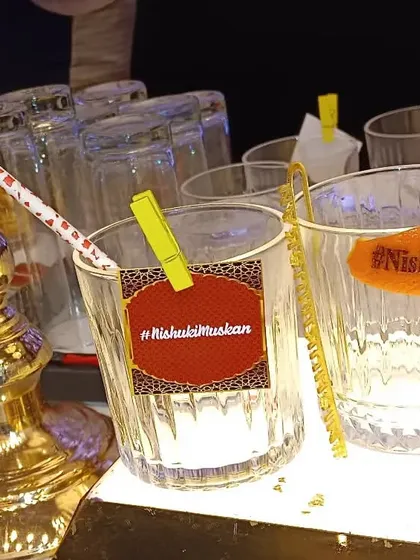 More examples of our custom glass tags, showing different designs and colors to match your event's theme.