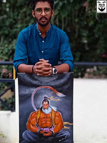 Standing with my completed Hanuman painting. This piece was a labor of love, and I'm proud of how the acrylic colors capture both the strength and calmness of the deity.