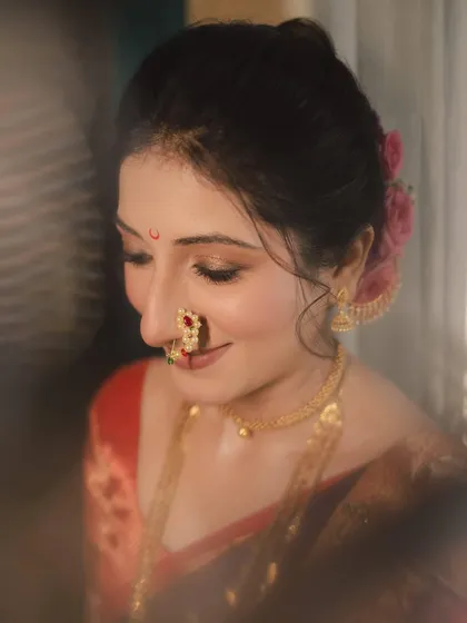 A soft, dreamy portrait of my bride Aditi. The focus is on her serene expression and the flawless makeup that enhances her natural beauty.