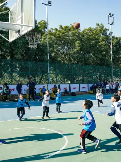 A young player takes a jump shot during a drill. We teach proper shooting form to all age groups.