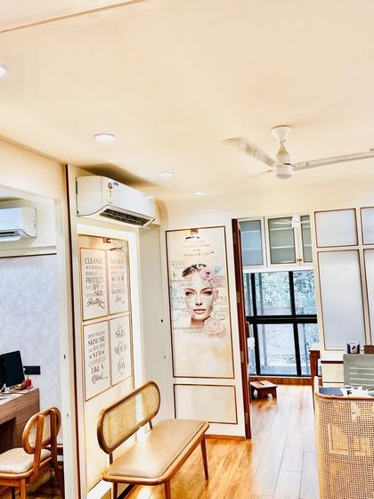 A look at the reception and waiting area of my clinic. I designed the space to feel welcoming and holistic, reflecting my philosophy of nurturing both a healthy skin and a happy soul.
