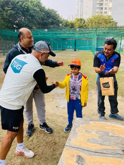 The winning team, TUG Blasters, being congratulated. We foster a competitive but friendly environment in our internal leagues.