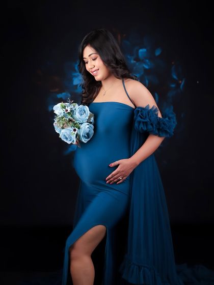 A collection of artistic shots featuring a gorgeous royal blue gown, from full-length portraits to creative close-ups on the fabric and bump.