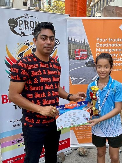 Nitika receiving her award for winning both the U-11 and U-13 categories at the Pronext Sports Zone Tournament. Her dominance in two age groups is exceptional.