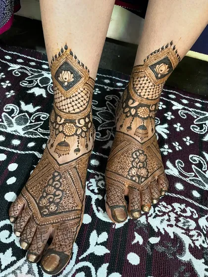 Another angle of the same leg design, showing how the pattern wraps around the foot and ankle.