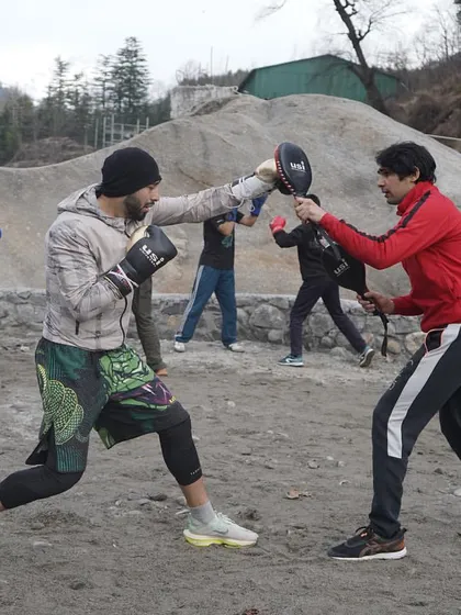 Pad work is essential for developing power, speed, and combinations. I work individually with participants to refine their striking and defensive skills.