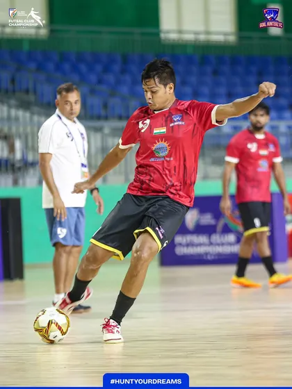 A player practicing his shooting during the warm-up.