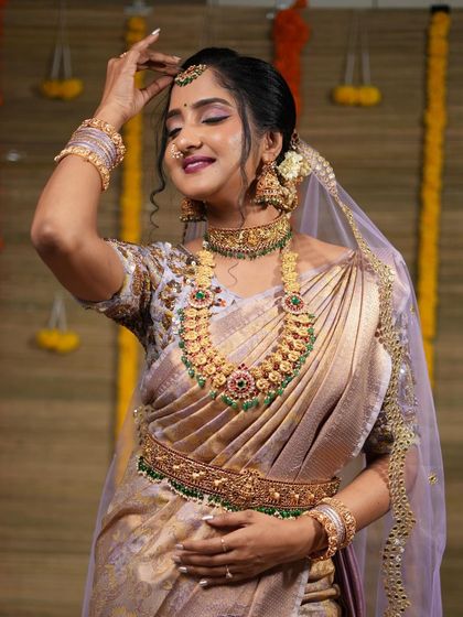 A gorgeous series of a model in a light purple saree, wearing our kemp stone bridal set. These photos show the jewellery from various angles, highlighting its beauty.