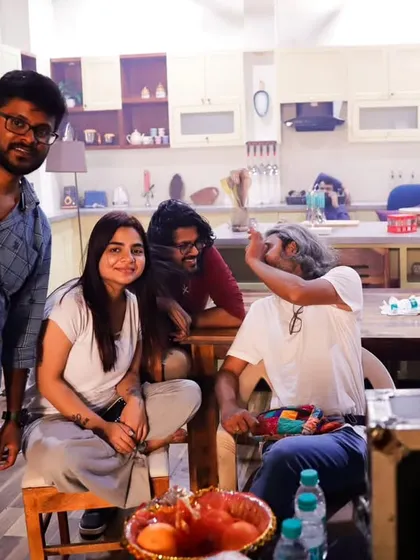 A candid moment with the team on set. A positive and collaborative atmosphere is important to me and helps bring out the best creative work from everyone involved.