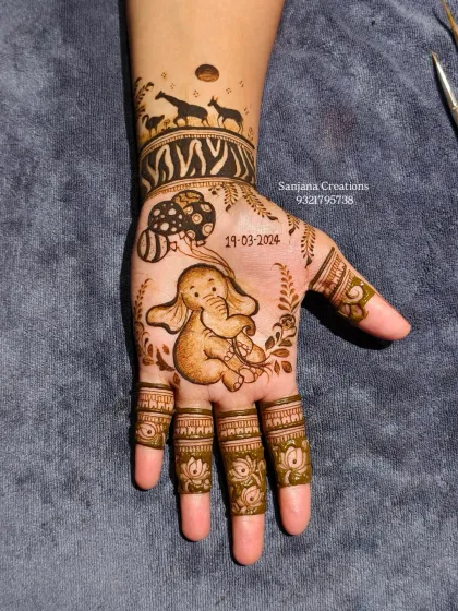 The other hand features an adorable baby elephant holding balloons, with the due date marked as a special memory.