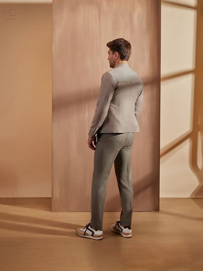 A back view of the neutral co-ord set, highlighting the clean lines and modern fit that define my approach to elegant winter style.