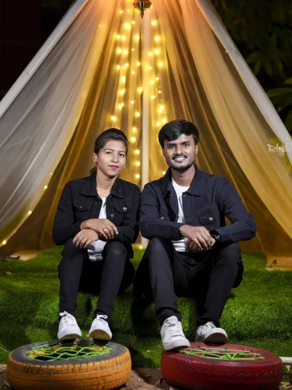 A relaxed pose in our tent setup, decorated with fairy lights. This creates a cozy, bohemian-inspired look for your pre-wedding photos.