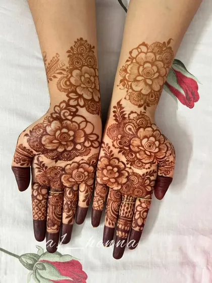 The stunning dark stain of a floral henna design. This is the result of using high-quality organic henna and proper aftercare.