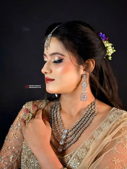 This angle highlights the beautiful, dewy finish on the skin and the soft, shimmery eyeshadow. It’s a look that says radiant and effortlessly beautiful.