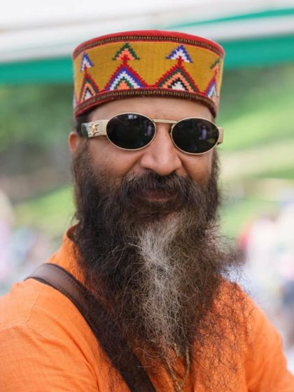 This is my modern sage look. I embrace both the traditional attire of my culture, like this Himachali topi, and the realities of a modern life, blending ancient wisdom with a relatable approach.