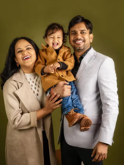 This is what it's all about: pure, uninhibited family joy. I love creating a space where you can forget the camera and just be yourselves, resulting in portraits filled with laughter.